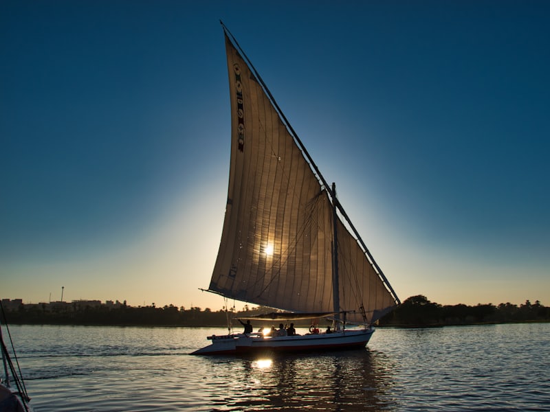 Dahabiya sailing the Esna reach at first light